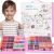 Smiling child with Springos 258-piece art set in pink case