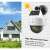 Solar powered security light with motion sensor and fake camera, white, mounted on house wall