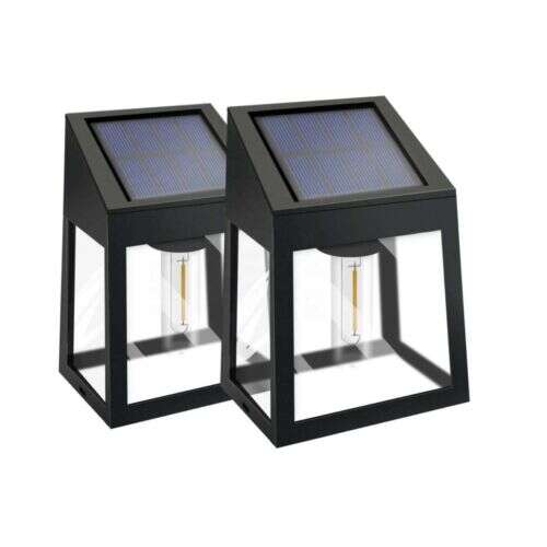 Zwei schwarze solarbetriebene Wandleuchten mit Edison-Glühbirnen