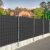 Graphite fence privacy strips installed on a residential fence