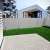 Springos light grey fence tape, installed on a fence, providing privacy and wind protection