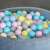 Close-up of Euro-Matic ball pit with pastel colored balls
