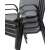 Close-up of stacked Zolta grey garden chairs