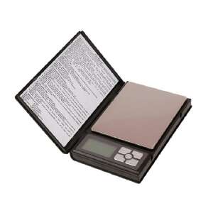 Black digital gram scale with a flip-up cover, perfect for weighing small items like jewelry, spices, or ingredients - Kitchen Scale