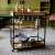 Silvius serving trolley, oak smoke/black, with three shelves, wine rack, towel holder, and removable tray