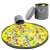 Yellow play mat with a grey storage bin filled with building blocks and other toys
