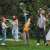 Family playing with FruBlu Mega Bubble Shooter in the garden
