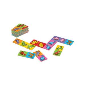 Orchard Toys Dino Dominoes game in action, showing the colorful dominoes with dinosaur images - Card Game