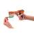 Tack Pro Crow II toy gun, orange and white, being loaded with a foam dart