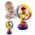 Baby playing with the spinning wheel toy, showing how it can be used
