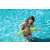 Child wearing Bestway green inflatable arm floats in a swimming pool