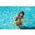 Child wearing Bestway green inflatable arm floats in a swimming pool