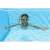 Child swimming in a pool wearing Bestway 21002 blue and orange swimming goggles