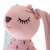 Close-up of the face of a pink plush bunny rabbit with a dress, 52cm