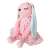 Side view of a pink plush bunny rabbit with a dress, 52cm