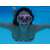 Woman wearing pink and black diving mask in swimming pool