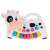 White and black cow shaped musical toy with piano keys and animal sound buttons