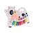 White and black cow shaped musical toy with piano keys and animal sound buttons