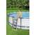 Woman using Bestway pool ladder to enter above ground pool