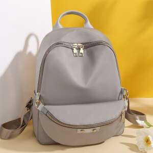 Дамска раница Dollcini в сив цвят, с просторен основен джоб и по-малък преден джоб - Раница