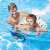 Child using Intex inflatable swim ring in a swimming pool, supervised by an adult