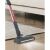 Hoover HF522STH cordless vacuum cleaner cleaning under furniture