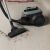Electrolux EL61C2OG bagless vacuum cleaner in use on hardwood floor