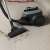 Electrolux Clean 600 bagless vacuum cleaner being used on a wooden floor