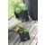 Prosperplast Rato Low flower pots with plants in garden setting