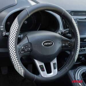 Black and white checkered steering wheel cover, Amio brand, installed on a car steering wheel - AMiO