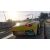 Grand Theft Auto V Xbox Series X: Yellow sports car speeding on a road