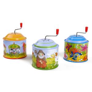 Drei bunte Aufzieh-Musikboxen mit verschiedenen Designs, perfekt für Kinder - Goki