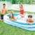 Intex Family Pool, 262 x 175 x 56 cm, inflatable pool for family fun, people enjoying the pool