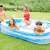 Intex Family Pool, 262 x 175 x 56 cm, inflatable pool for family fun, people enjoying the pool