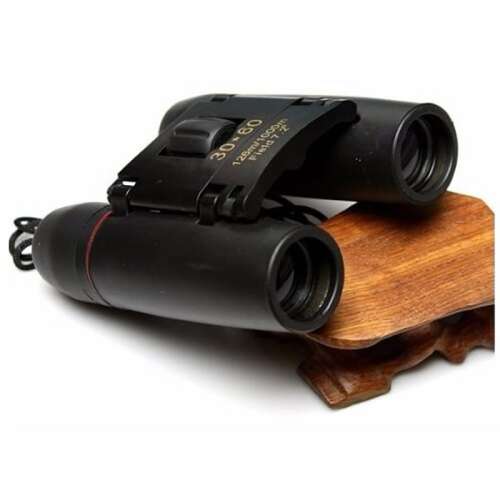 Sakura 30x60 binoculars, black, with red accents, on a wooden stand