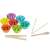 Colorful silicone cups with wooden tools for sorting and playing with Montessori beads