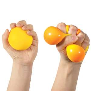 Needoh Color Change Stress Ball in yellow and orange, squeezed in hand - Office accessory