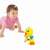 Baby playing with Hola Toys Dancing Duck, interactive toy with lights and music