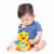 Baby playing with Hola Toys Dancing Duck, interactive toy with lights and music