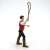 Side view of Papo Animal Tamer figurine, a man in a red vest and black pants holding a whip, for imaginative play