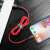 Baseus Cafule Red USB to Lightning Cable Connecting iPhone and Laptop
