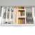 FlexiSPACE spice rack in a kitchen drawer with cutlery and other kitchen utensils