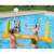 People playing volleyball in a pool with an Intex inflatable volleyball set