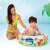 Child playing in Intex Beach Buddies inflatable pool with dinosaur design