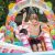 Boy playing under the water sprayer in the Intex Candy Zone inflatable pool