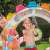 Children enjoying the Intex Candy Zone water sprinkler feature