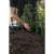 Fiskars Solid™ hand cultivator used for planting and weeding