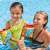 Child wearing Intex inflatable arm floats in the pool, shark design