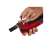 Einhell TC-MG 18 Li-Solo cordless multi-tool, red and black, close-up of a hand changing the blade
