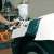 Einhell paint sprayer in use, painting a car